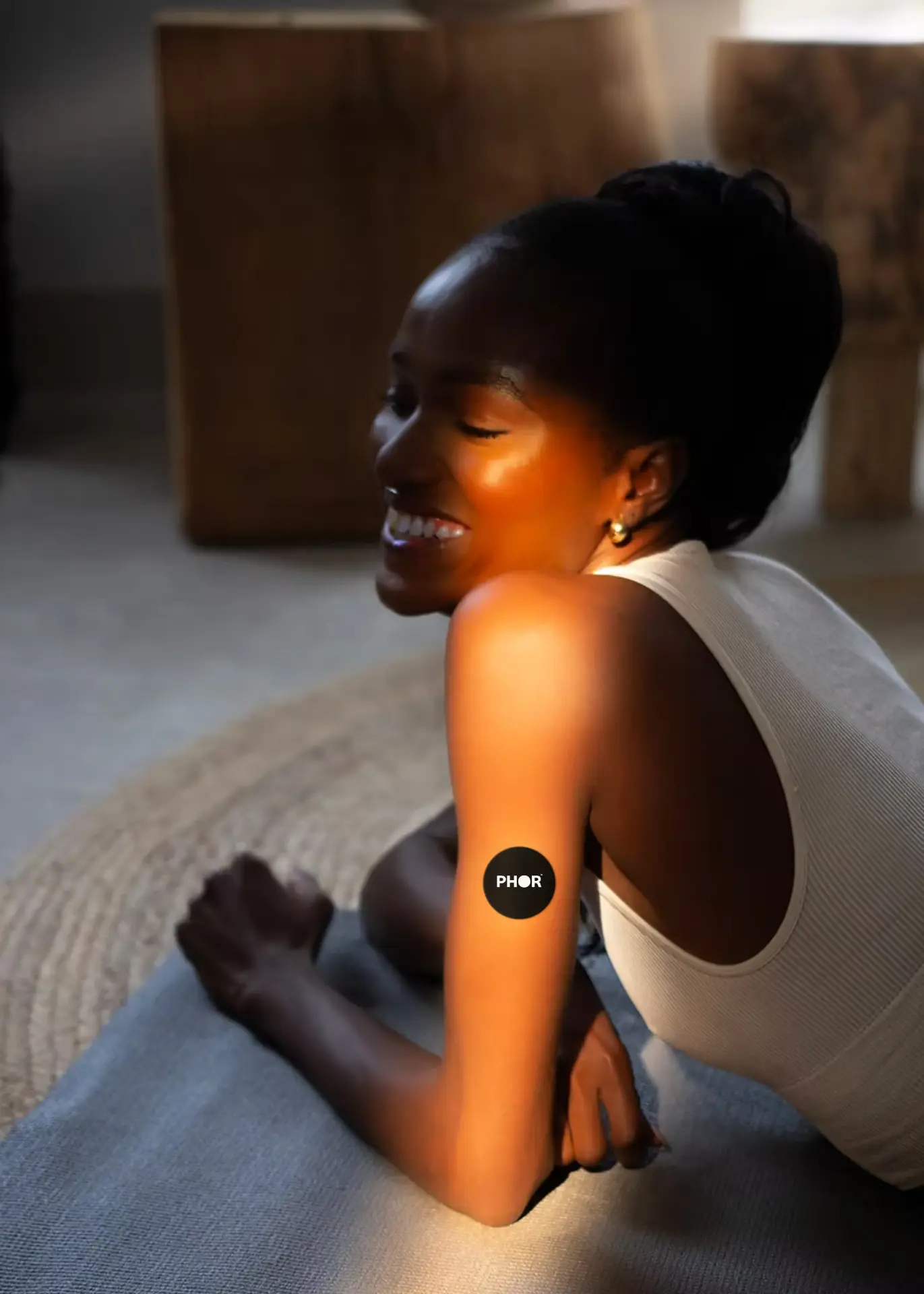 User wearing the PHOR patch during a recovery session
